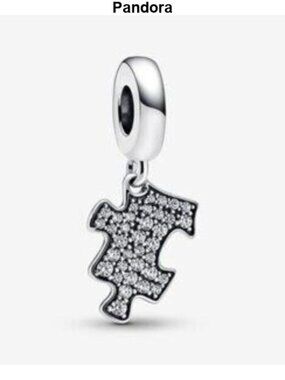 Authentic Pandora Sparkling Puzzle Piece Dangle Charm.